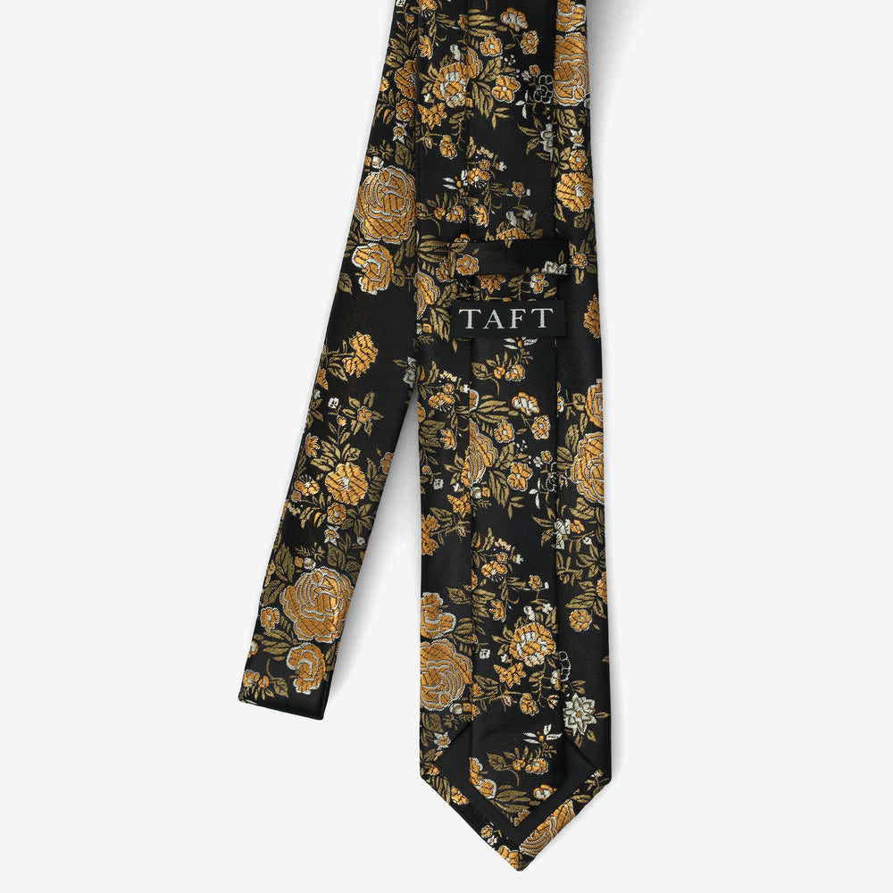 Floral-patterned tie with 'Taft' branding on a white background
